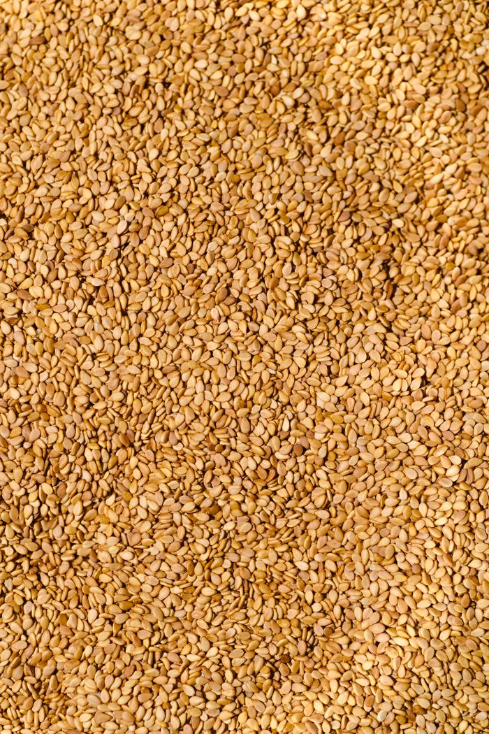 Raw sesame seed spread out for sorting.